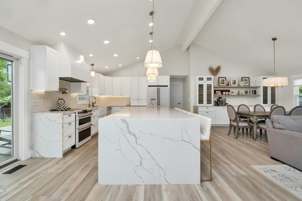 Professional real estate photography of contemporary kitchen with central island