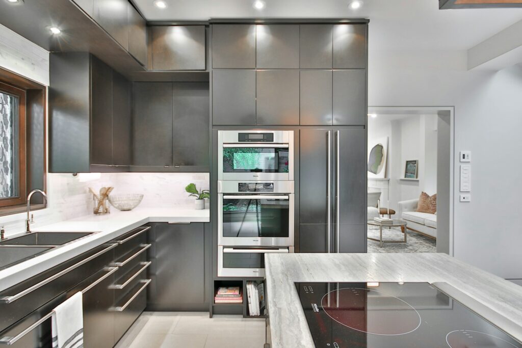 Professional real estate photography of luxury kitchen with stainless steel appliances